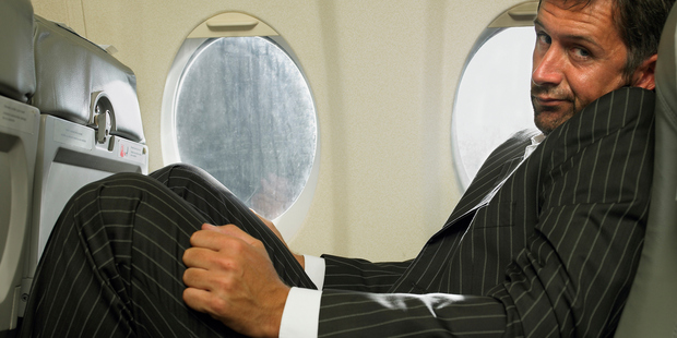 Choose the right airline and you won't end up like this guy. Photo / Getty Images