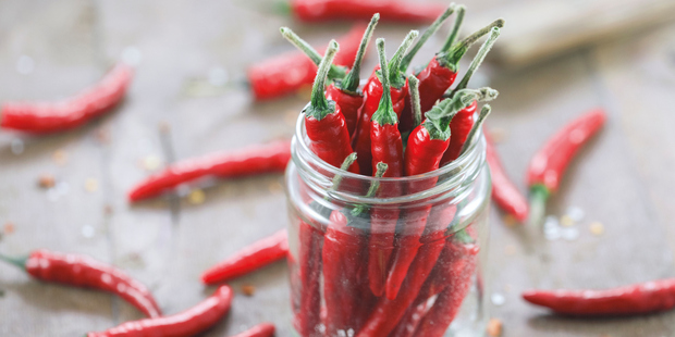 Try adding chillies to marinades, curries or finely diced on top of a salad. Photo / Getty