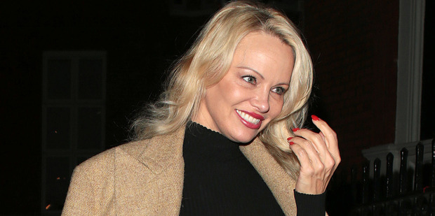 Pamela Anderson seen arriving at the Ecuadorian Embassy to visit Julian Assange on March 9, 2017 in London. Photo / Getty