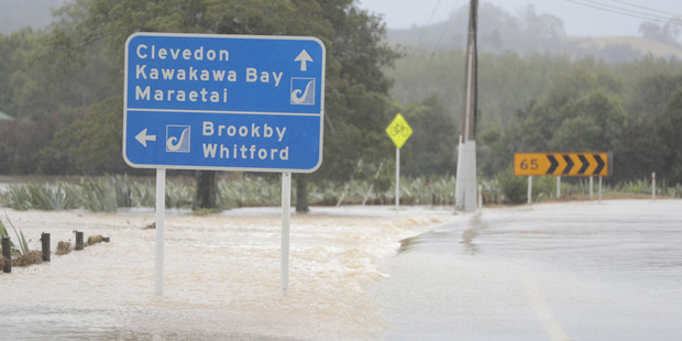 Road closed to Clevedon after heavy rains caused widespread flooding across the eastern Auckland region. Photo / Michael Craig