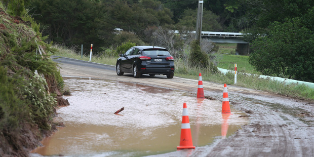 Heavy rain has cut off the township of Whiritoa on the Coromandel. Photo / John Borren