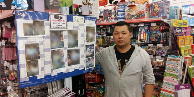 Coin Save owner Tony Lin said he has used a wall of shame in his store for about a year to help deter theives. Photo/Ruth Keber
