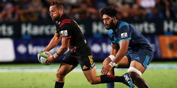 Chiefs' first five Aaron Cruden shapes to pass during the Super Rugby rugby match - Chiefs v Blues. Photo / Bruce Lim