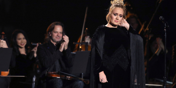 Adele reacts after a performance tribute to George Michael at the 59th annual Grammy Awards on February 12. Photo / AP