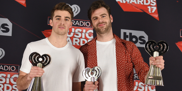 Drew Taggart and Alex Pall of the Chainsmokers, pose with the awards for best new artist, best new pop artist and dance song of the year. Photo / AP