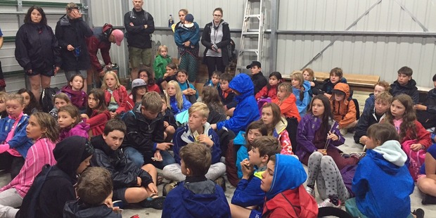 Students evacuated after flooding at Camp Adair in the Hunua Ranges south of Auckland. Photo / Supplied