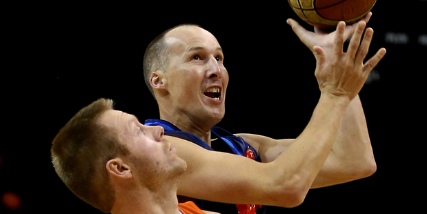 Phill Jones of the Nelson Giants grabs the rebound against the Southland Sharks. Photo / Photosport