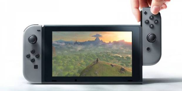 The Nintendo Switch in portable mode. The controllers slide onto the side of the tablet.