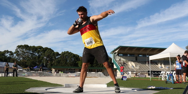Ryan Ballantyne begins his rotation at the NZ track and field nationals in Hamilton. Photo/Macspeedfoto