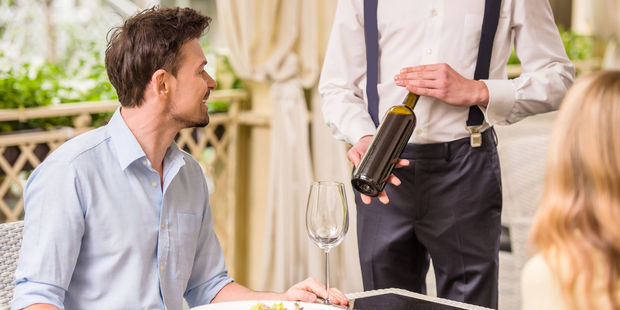 Restaurants know diners will often choose the second or third cheapest wine on the list - and place wines with a high mark up in these slots on purpose. Photo / 123RF