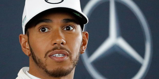 Lewis Hamilton, at the launch of the new Mercedes last month, is favoured to win the drivers' championship. Photo / AP