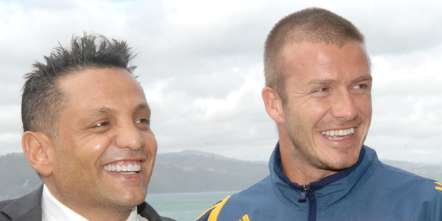 Terry Serepisos, pictured here with David Beckham, was once a minor celebrity in New Zealand. Photo / File