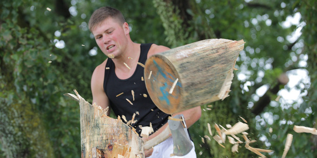Jack Jordan of Taranaki competes in the ANZAXE Wood Chopping Championship at the Hilux New Zealand Rural Games. Photo / Neco Wieringa