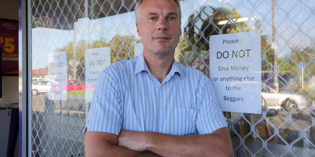 Pharmacist Andrew Spence says he has seen beggars coming and going in cars. Photo/Duncan Brown