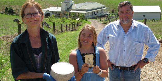 New Zealand's top cheesemaker for 2017, Cathy Oakley of Kerikeri's Just Ewe, with fellow Just Ewe cheesemaker George Houry and his daughter, Lilly-Marie, 12. Photo/Peter de Graaf
