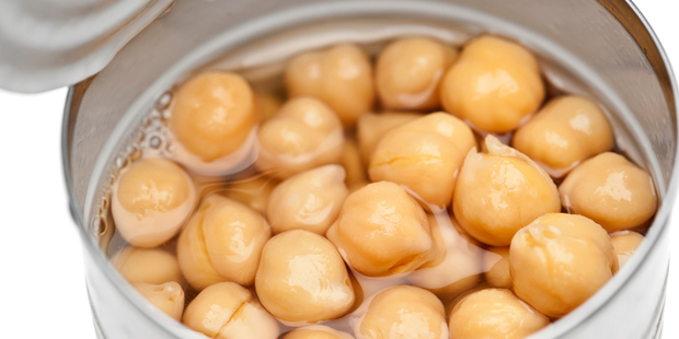 Should we be using the water inside our can of chickpeas? Photo / Getty Images