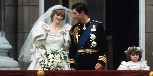 The Prince and Princess of Wales pose on the balcony of Buckingham Palace on their wedding day. Photo / Getty