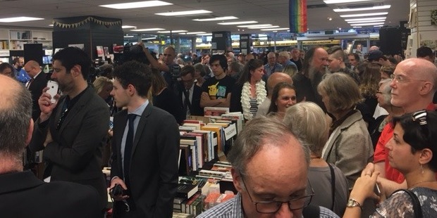 Hundreds of people, including a large media contingent, crammed into the Unity Books store for the book's launch. Photo / Nicholas Jones