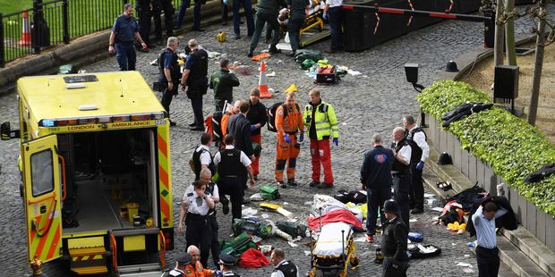 Emergency services at the scene outside the Palace of Westminster. Photo / AP