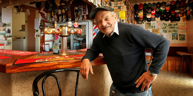 Bruno Clausen in the bar of his Lottin Point motel. Photo / Alan Gibson