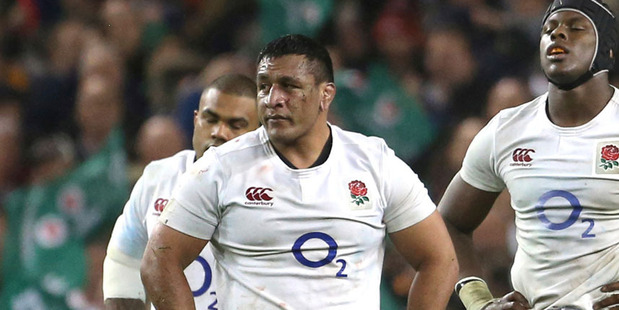 England's Billy Vunipola, left, and, Maro Itoje, react after the final whistle. photo / AP