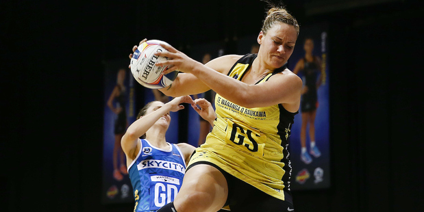 Catherine Tuivaiti of the Pulse wins the ball from Anna Harrison of the Mystics. Photo / Photosport