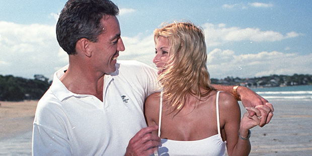 Eric Watson and his then fiancee Nicky Robinson walk along Takapuna Beach on Auckland's North Shore in 1998.