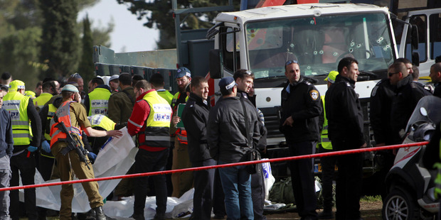 Israeli police investigates the scene of an attack in Jerusalem on January 8, 2017, in which four people were killed. Photo / AP
