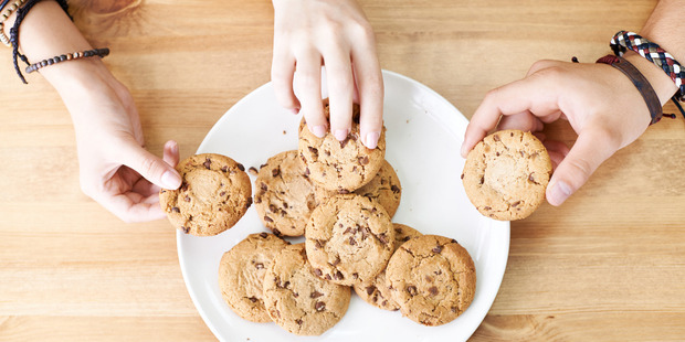 To restore crispness to biscuits, place them on a paper towel on top of a plate and microwave for 40 seconds. Photo / Getty Images