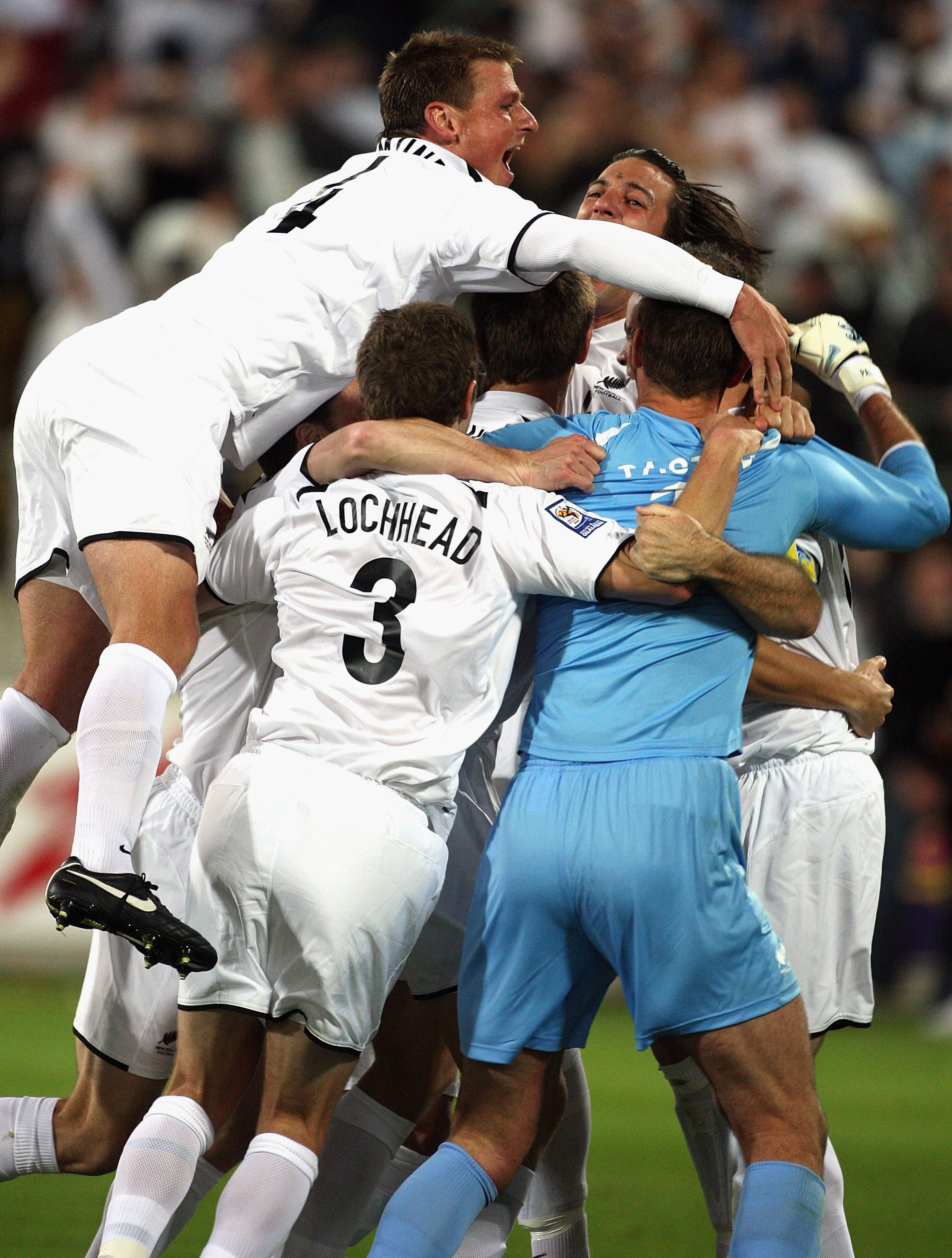 The All Whites celebrate after defeating Bahrain in the inter-confederation playoffs in Wellington in 2009. Photo / Getty Images.
