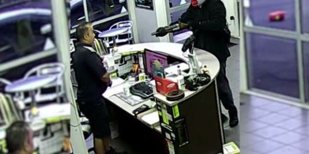 Loading Danny Dhanak says he is lucky to be alive after his car repair workshop was held up by a man armed with a sawn-off shotgun. Photo Supplied