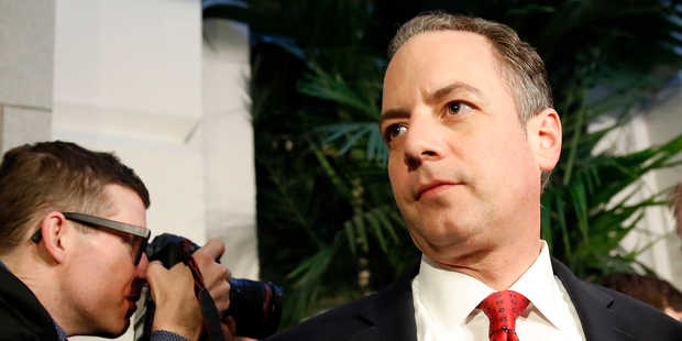 White House Chief of Staff Reince Priebus, right, departs after a Republican caucus meeting on Capitol Hill. Photo / AP