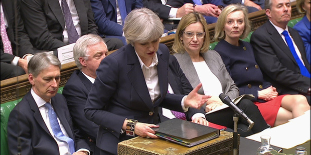 Britain's Prime Minister Theresa May gives news of triggering the Article 50 clause to initiate Britain's separation from the European Union, inside the House of Commons in London. Photo / AP