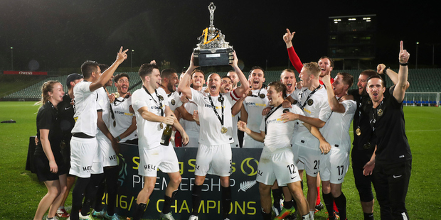 Team Wellington celebrate with the trophy. Photo / Photosport