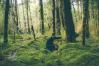 Craig Bond checks one of Goodnature's pest traps. Craig Bond checks one of Goodnature's pest traps.