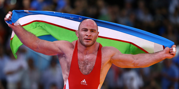 Artur Taymazov of Uzbekistan celebrates a gold medal at the 2012 Olympics. Photo / Getty