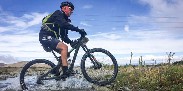 Michael Brown makes his way though the southern country side during stage three of the 7 day Epic, Pioneer Mountain Bike. Photo / Michael Brown