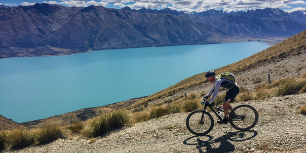 Michael Brown makes his way though the southern country side during stage four, from Lake Tekapo to Lake Ohau. Photo / Greg Bowker