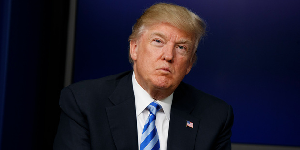Visitors planning getaways to the U.S. might have to relinquish their cell phone contacts and passwords under new "extreme vetting" procedures. Photo/AP Photo/Evan Vucci