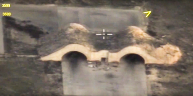 In this photo made from the footage taken from Russian Defense Ministry official web site shows shelters for aircraft at a Syrian airbase after it was hit by US missiles. Photo / AP