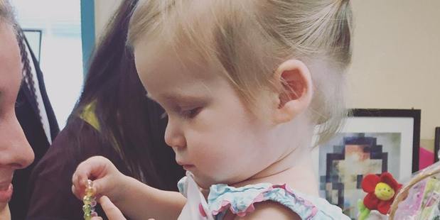 Marian McGlocklin, 19 months, has been diagnosed with 'childhood Alzheimer's' known as NPC. Photo / Facebook, Hope For Marian