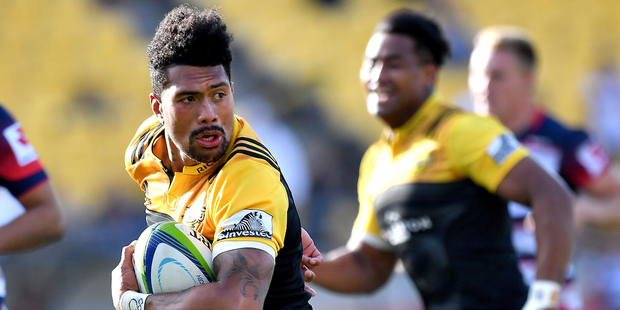 Ardie Savea of the Hurricanes runs with the ball with Julian Savea in support. Photo / Photosport