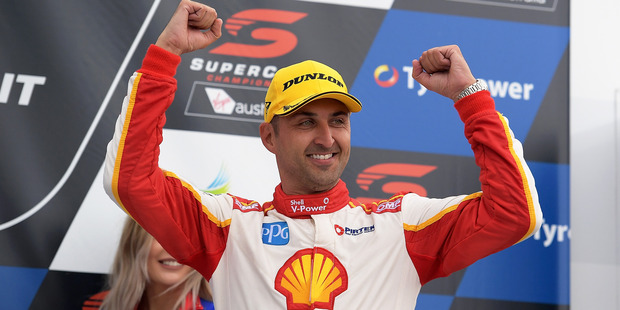 Fabian Coulthard celebrates after winning race four of the Tasmania SuperSprint. Photo/Getty Images