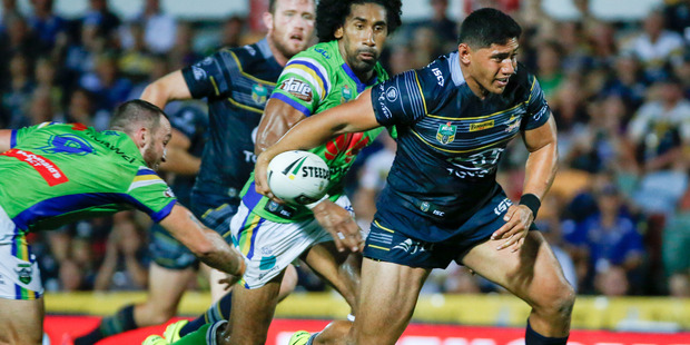 Cowboys forward Jason Taumalolo breaks free from the Raiders' Josh Hodgson. Photo/AAP Photos