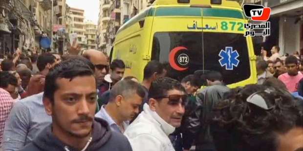 An ambulance outside Saint Mark's Cathedral following a suicide bombing that killed several people, just after Coptic Pope Tawadros II finished services. Photo / AP
