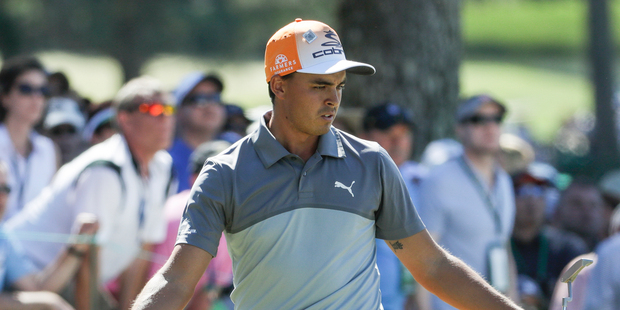 Rickie Fowler reacts to a put on the seventh hole during the final round of the Masters golf tournament, Sunday, April 9, 2017, in Augusta. Photo / AP.