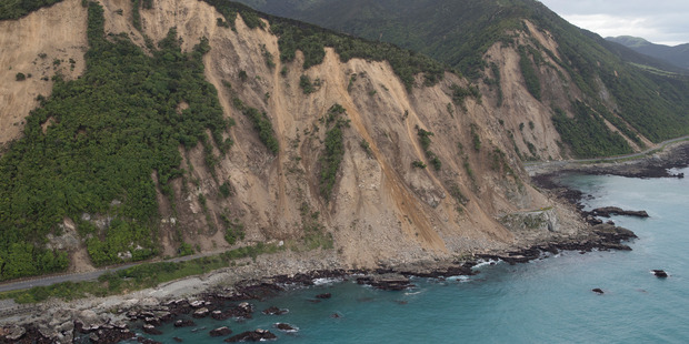 A picture taken immediately after the quake shows a large landslide blocking State Highway 1, near Kaikoura. Photo / File