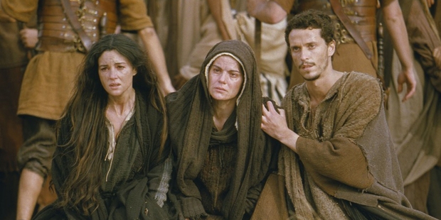 In The Passion of The Christ, Mary Magdalene, played by Monica Bellucci, left, stayed with Mary and John as Jesus was crucified. Photo / File