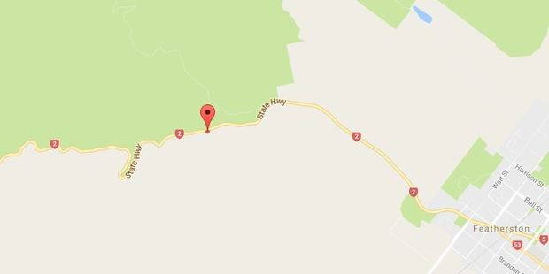 The entire south-bound lane has been blocked at the bottom of the Featherson side of the hill.
