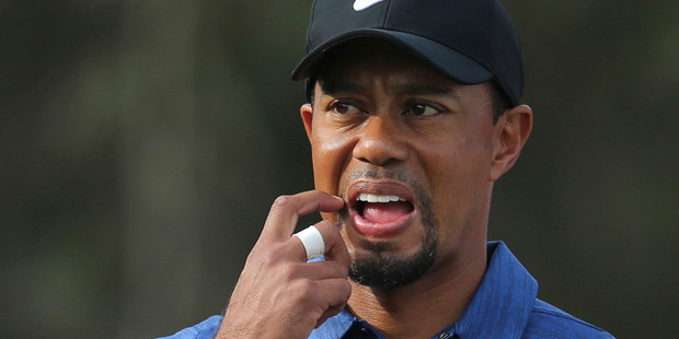 Tiger Woods is likely to go another full year without playing a major. Photo / AP